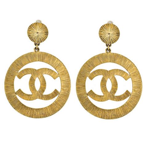 gold chanel dangle earrings|Chanel dangle earrings for sale.